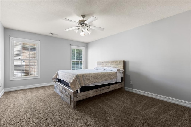 1360 Mount Mickinley Dr, Grayson, GA 30017 - bedroom with carpet, ceiling fan, and a textured ceiling