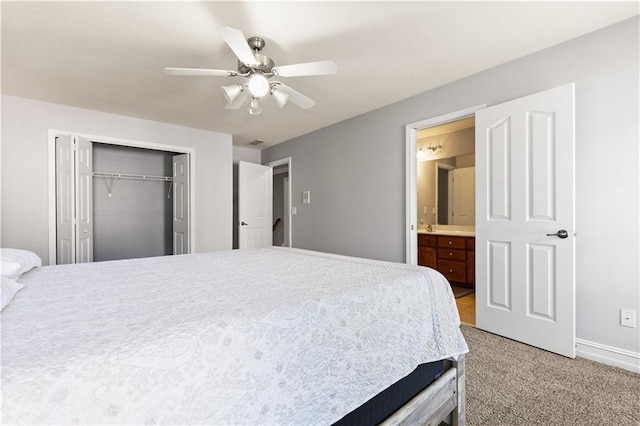 1360 Mount Mickinley Dr, Grayson, GA 30017 - bedroom featuring a closet, light colored carpet, ceiling fan, and ensuite bath
