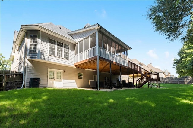 1360 Mount Mickinley Dr, Grayson, GA 30017 - rear view of house featuring a sunroom, stairs, and a deck