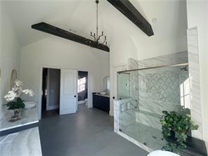 bathroom with beamed ceiling, a stall shower, high vaulted ceiling, and finished concrete floors