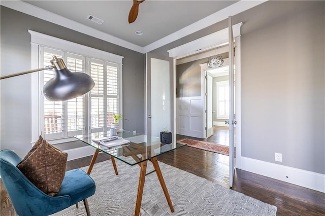 office with visible vents, baseboards, wood finished floors, and a ceiling fan