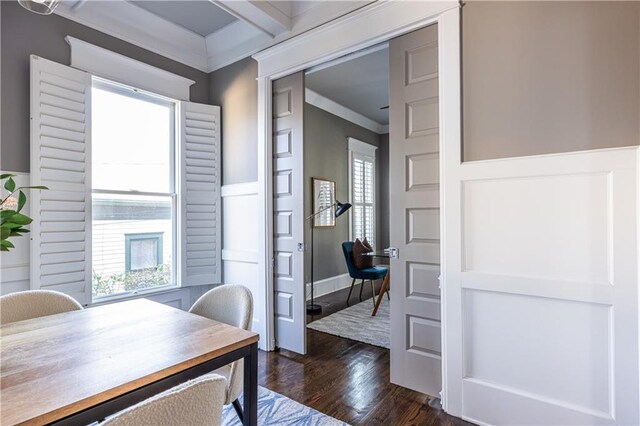 office with a wainscoted wall, dark wood-type flooring, and crown molding