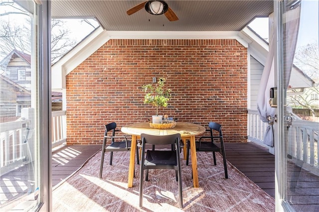 sunroom / solarium with ceiling fan