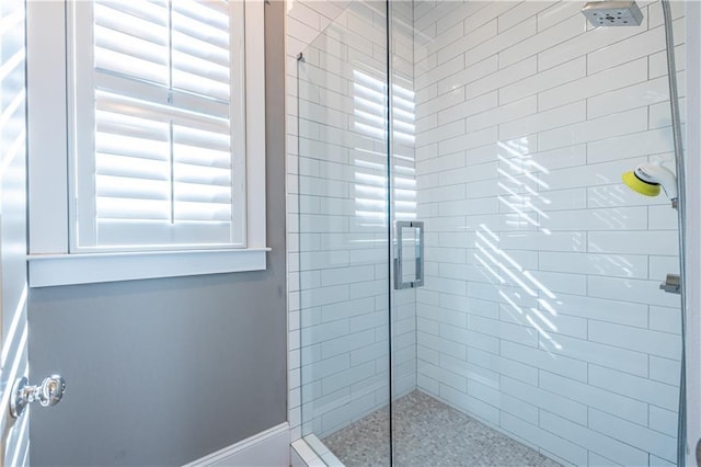 bathroom featuring a shower stall