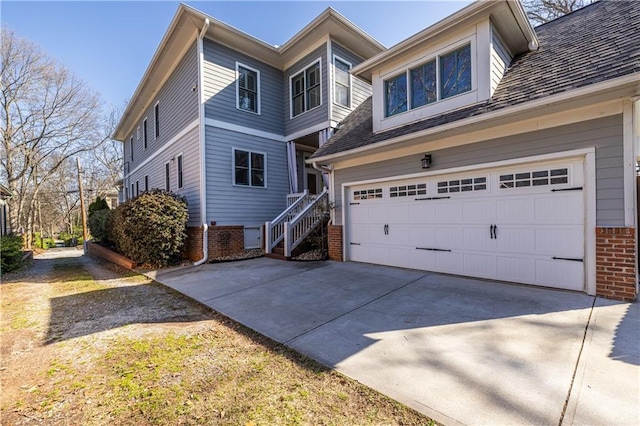 view of front of property with concrete driveway