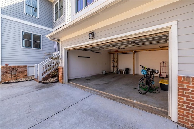 garage featuring driveway