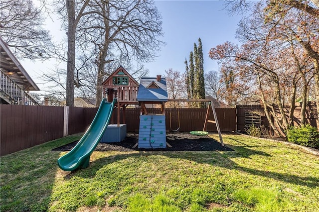 view of jungle gym with a fenced backyard and a lawn