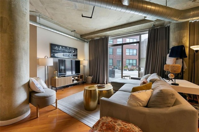 living area with wood finished floors