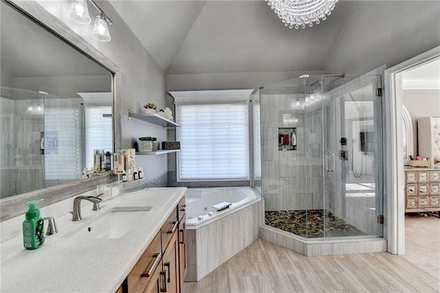 bathroom with vanity, plus walk in shower, and vaulted ceiling