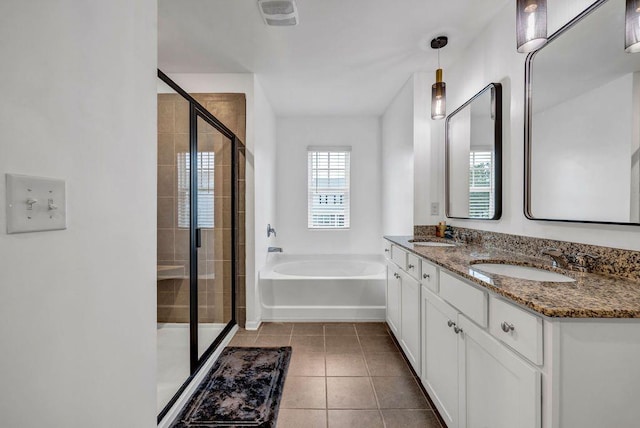 bathroom featuring vanity, separate shower and tub, and tile patterned flooring