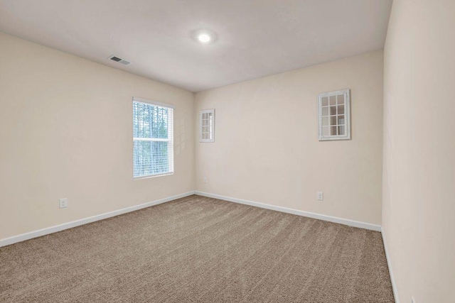 view of carpeted spare room