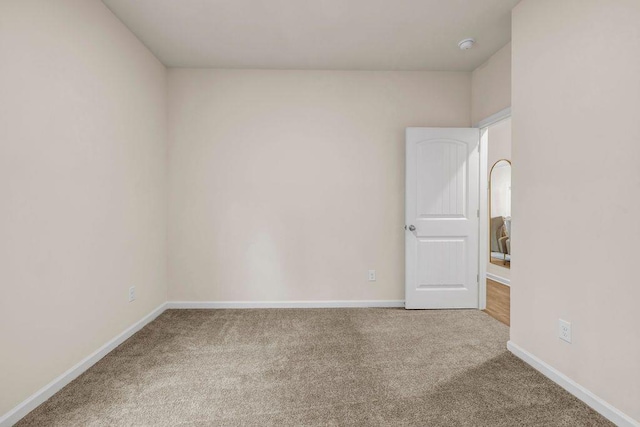 spare room with carpet