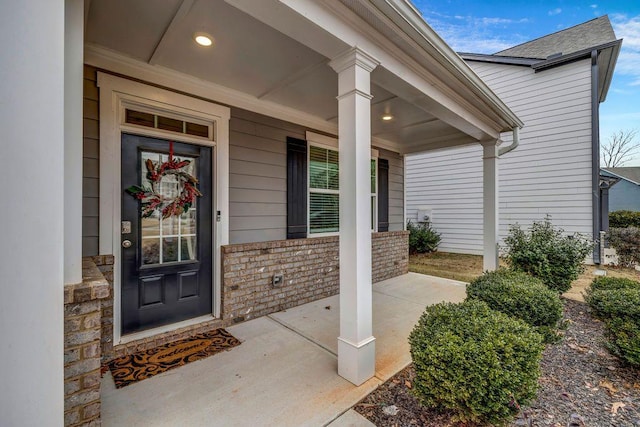 doorway to property featuring a porch