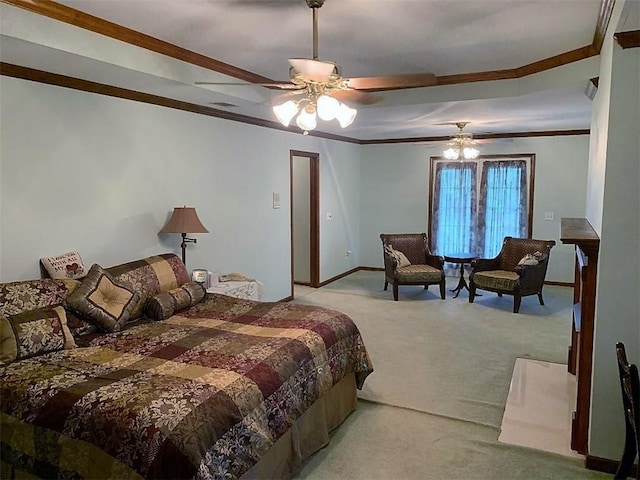 carpeted bedroom with ceiling fan and crown molding