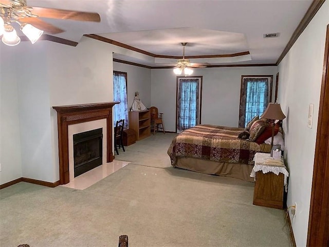 bedroom featuring ceiling fan and light carpet