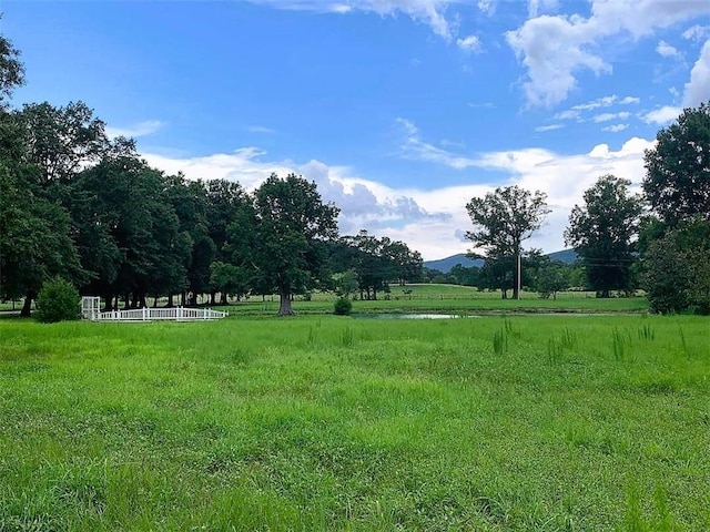 exterior space with a rural view