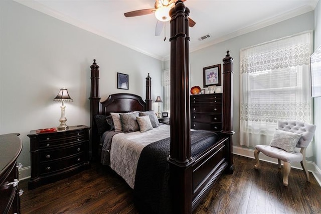 bedroom featuring baseboards, crown molding, visible vents, and dark wood-style flooring