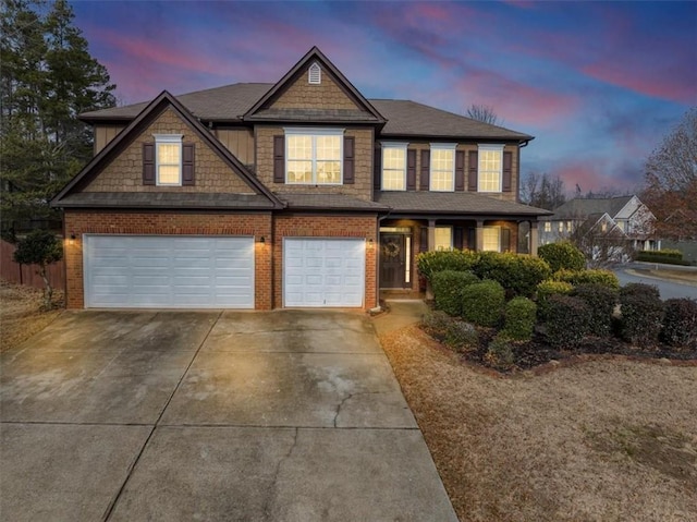 view of front of property with a garage