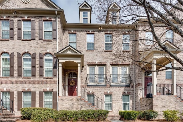 multi unit property featuring brick siding