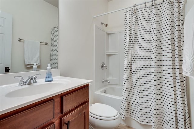 full bath with shower / bath combo, vanity, and toilet