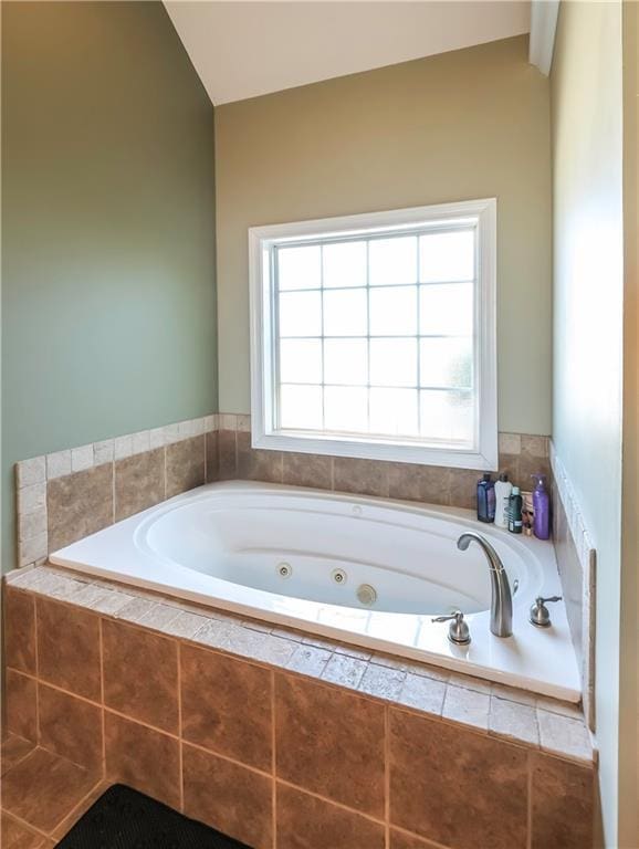 bathroom with a whirlpool tub