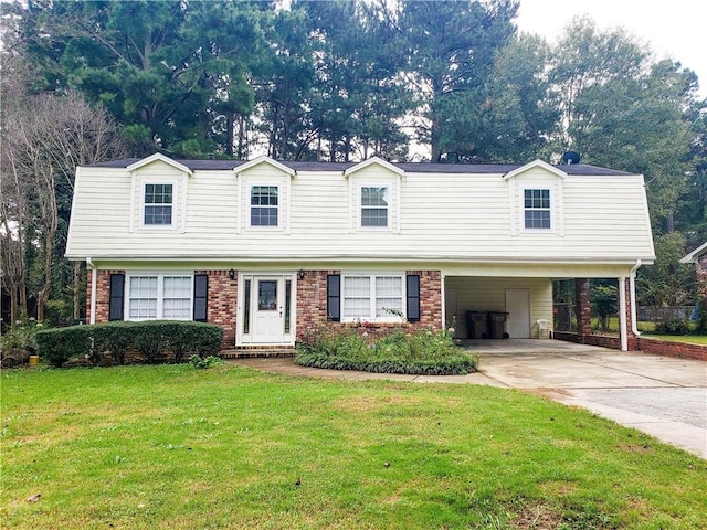 view of front facade with a carport and a front yard