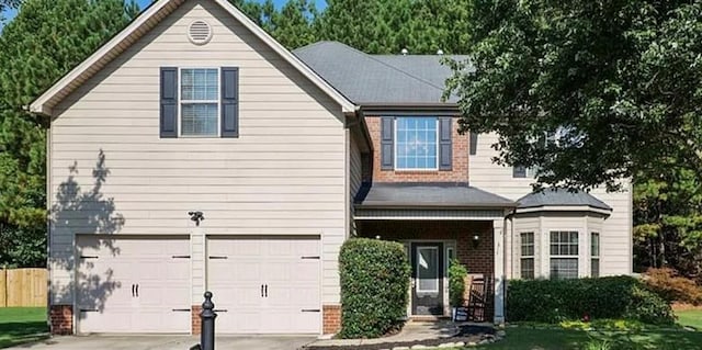 view of front of home with a garage