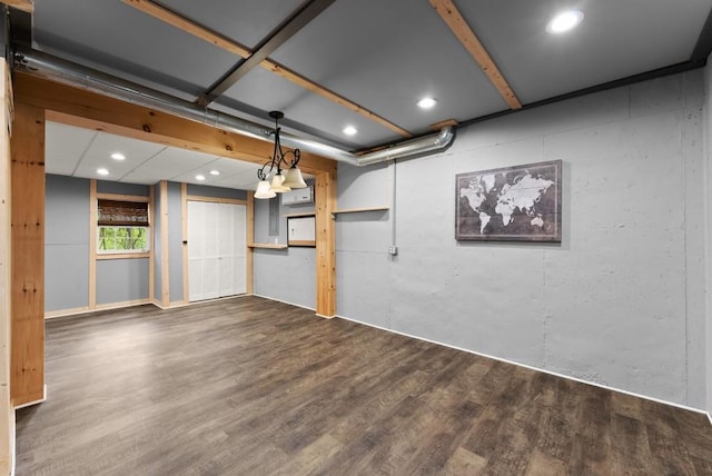 basement with recessed lighting and dark wood finished floors