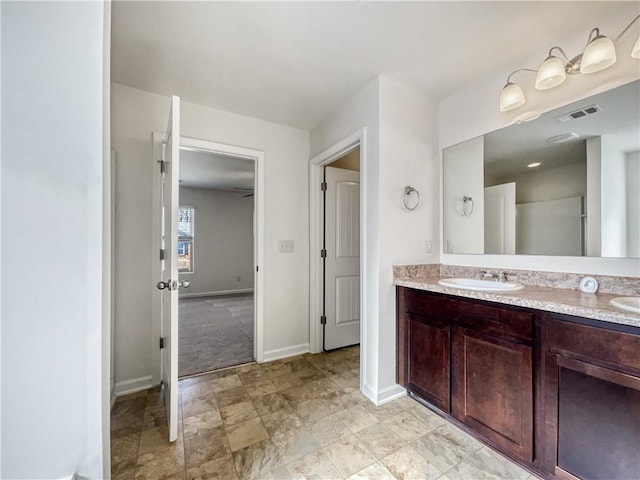 bathroom with vanity and ceiling fan