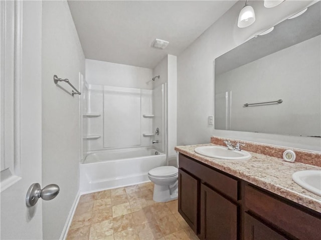 full bathroom featuring vanity, washtub / shower combination, and toilet