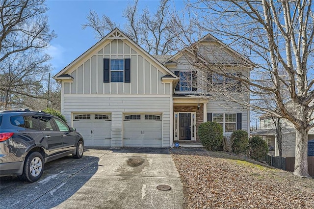 view of front of property featuring a garage, driveway, and board and batten siding