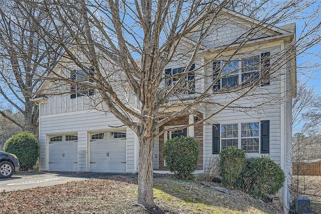 view of front of house featuring a garage and driveway