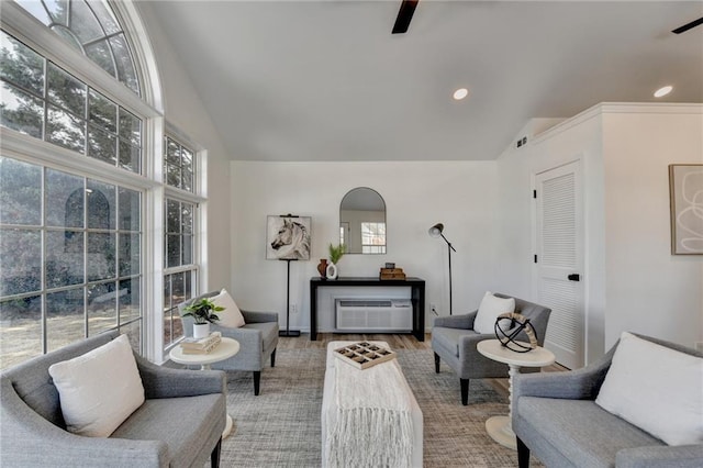 interior space with a healthy amount of sunlight, high vaulted ceiling, and wood-type flooring