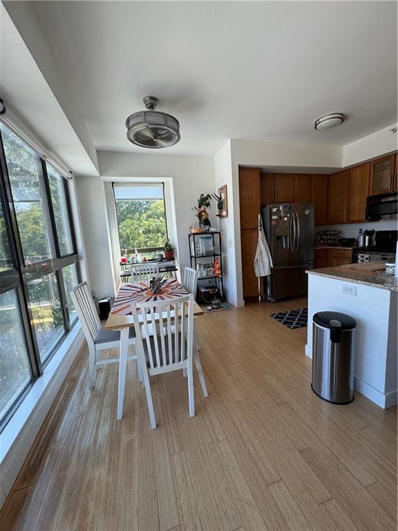 dining space featuring hardwood / wood-style flooring