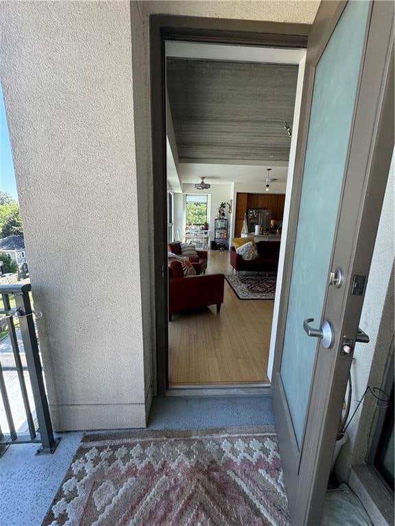 entrance to property with a balcony