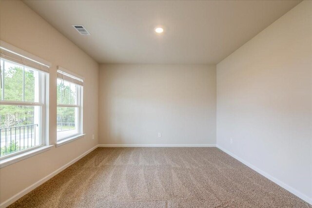 spare room with carpet flooring