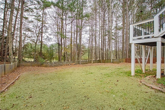 view of yard with a deck