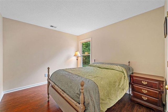 404 Pine Grove Way, Woodstock, GA 30189 - bedroom featuring wood finished floors, baseboards, and a textured ceiling
