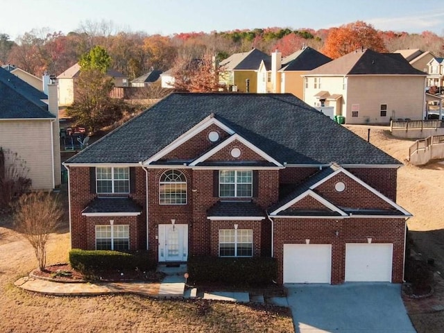 front facade with a garage