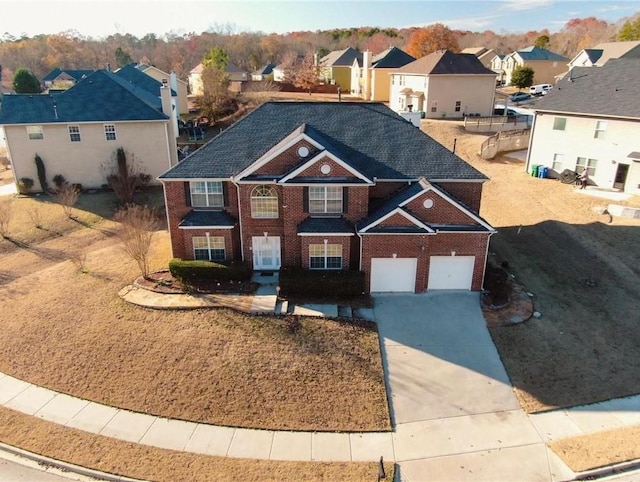 front of property with a garage