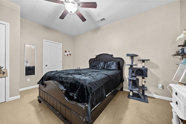 bedroom featuring ceiling fan and light carpet