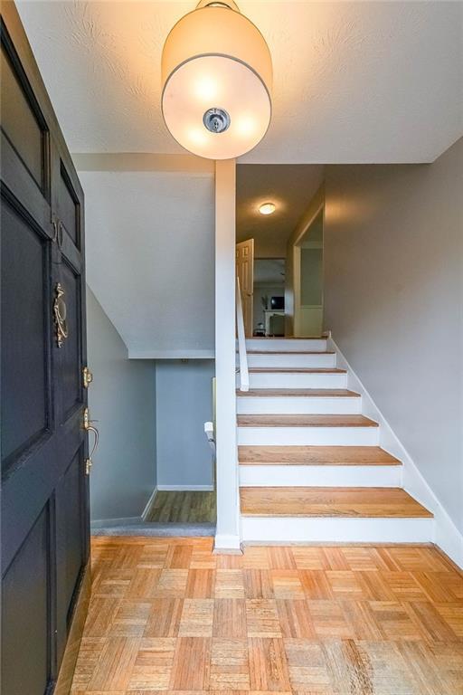 staircase with baseboards