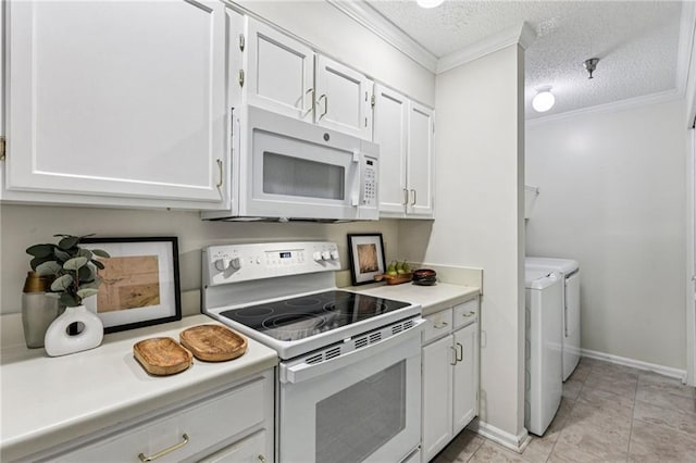 302 Ridley Howard Ct Unit 302, Decatur, GA 30030 - kitchen with white appliances, washer and dryer, white cabinets, light countertops, and a textured ceiling