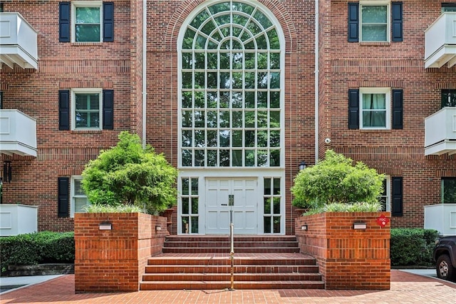 302 Ridley Howard Ct Unit 302, Decatur, GA 30030 - doorway to property with brick siding