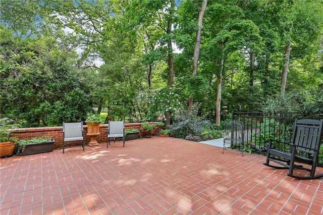302 Ridley Howard Ct Unit 302, Decatur, GA 30030 - view of patio with view of wooded area