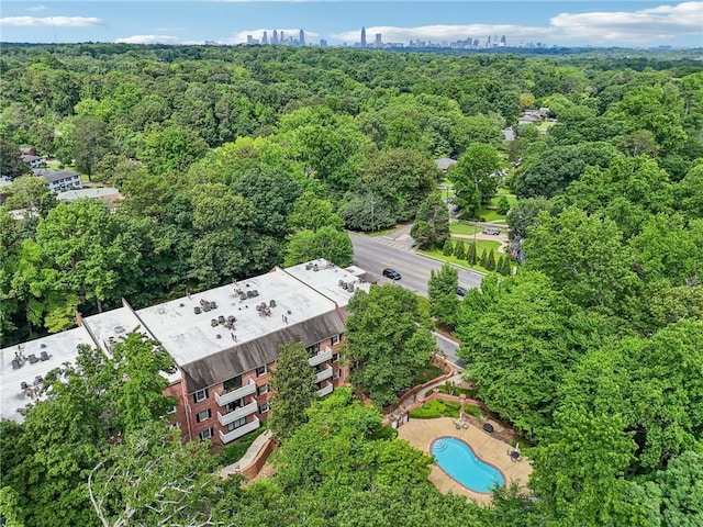 302 Ridley Howard Ct Unit 302, Decatur, GA 30030 - aerial view of a forest and a pool