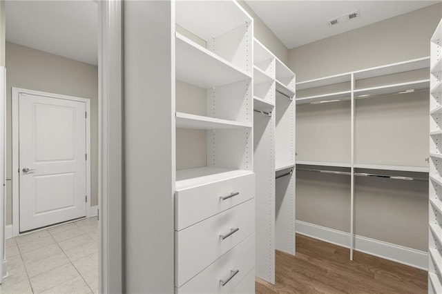 spacious closet with visible vents and light wood finished floors