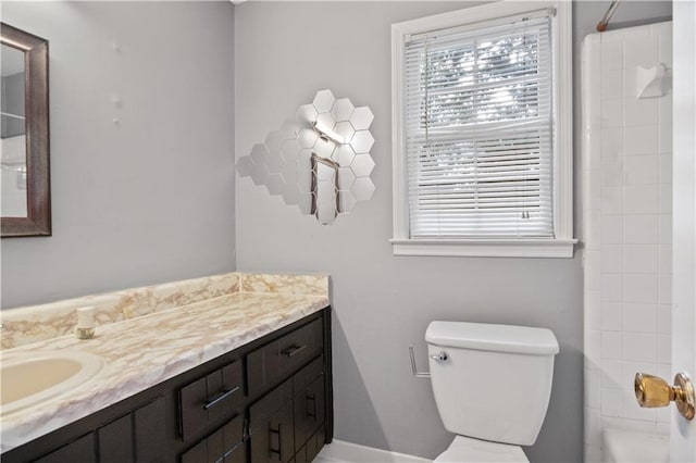 6945 Butner Rd, Atlanta, GA 30349 - bathroom with vanity and toilet