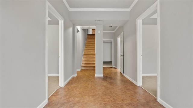 hall featuring visible vents, stairway, baseboards, and ornamental molding