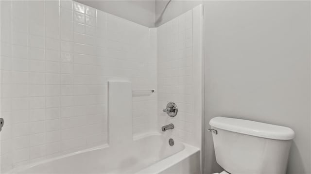 full bathroom with shower / tub combination and toilet